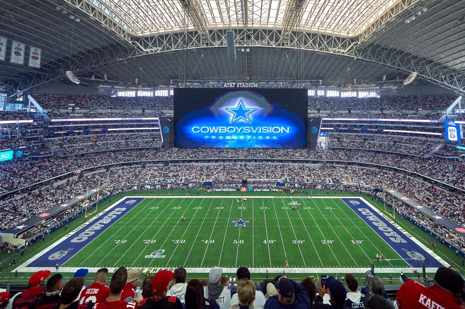 General view of AT&T Stadium during an NFL game.