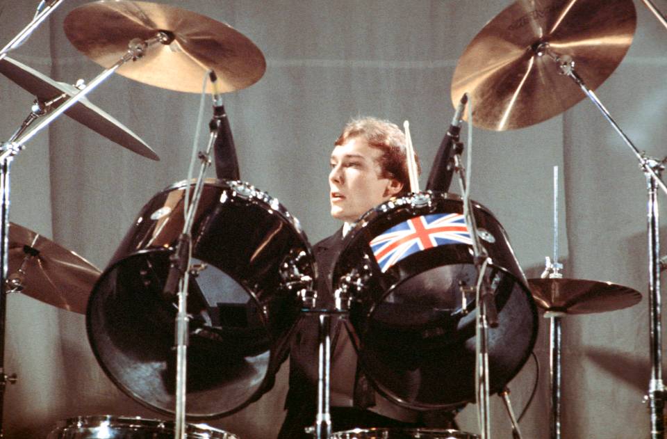 Rick Buckler performing live onstage at Hammersmith Odeon.