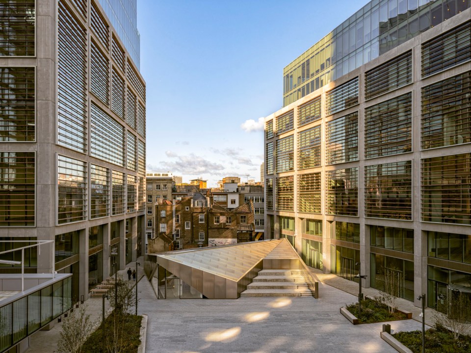 Museum of Shakespeare courtyard between modern buildings.