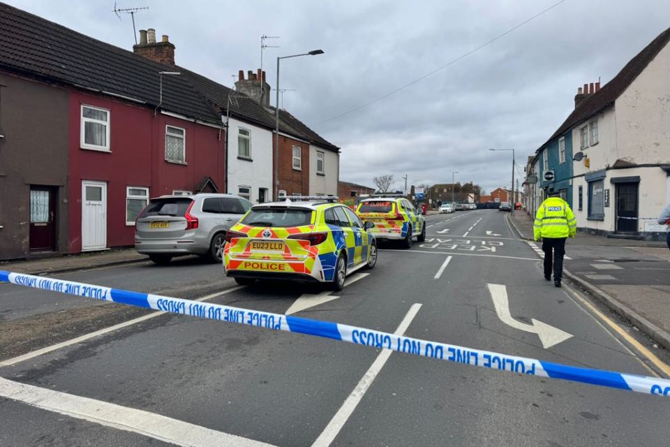 Police cars at a crime scene in Colchester.