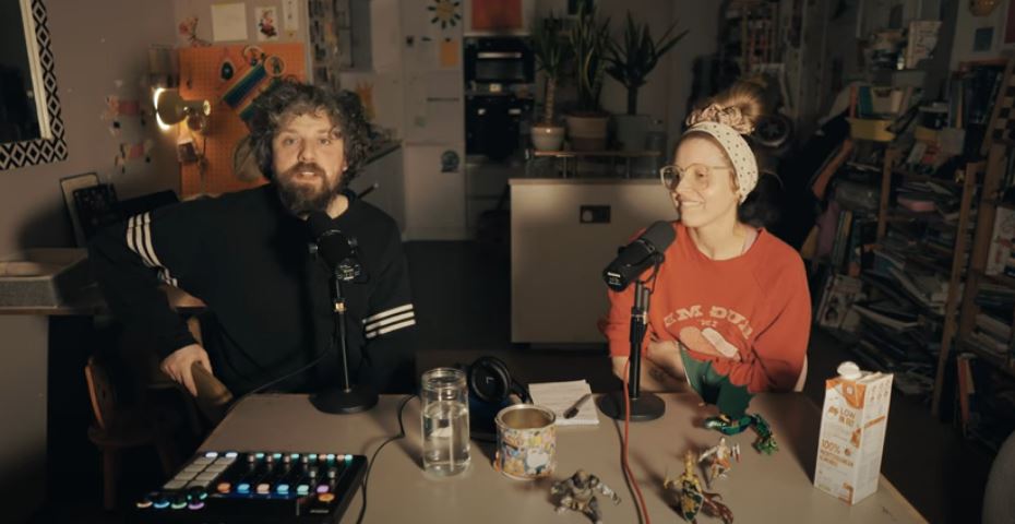 Jessie Cave and Alfie Brown on a podcast.