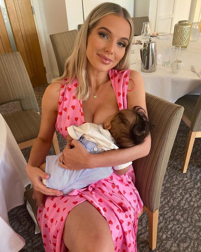 Woman breastfeeding baby.