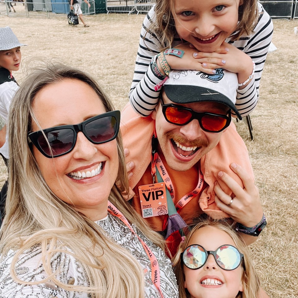 Family selfie at a festival.