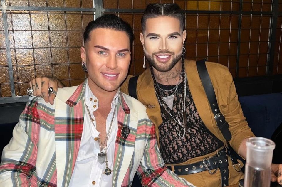 Photo of two men sitting together.