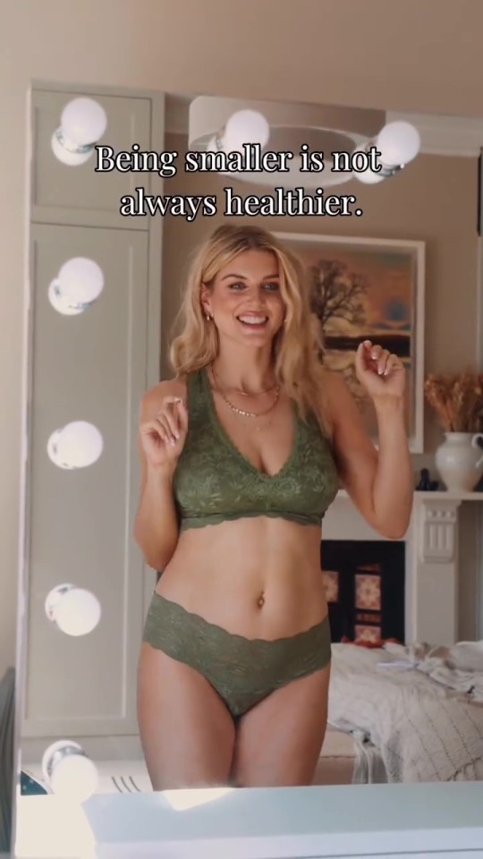 Woman in olive green lingerie in front of a mirror; text overlay: "Being smaller is not always healthier."