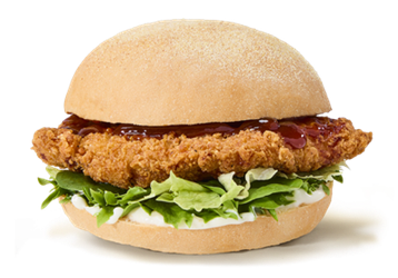 Crispy chicken sandwich with barbecue sauce and lettuce.