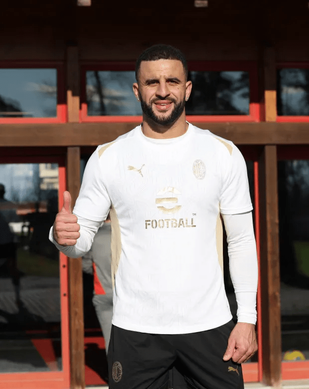 Man in Inter Milan training kit giving thumbs up.