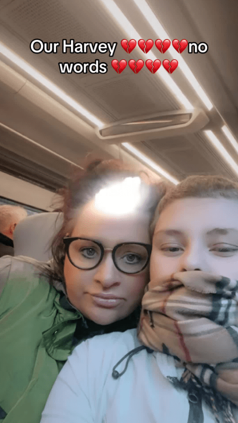 Photo of a woman and a boy on a bus, text overlay reads "Our Harvey, no words" with several broken heart emojis.