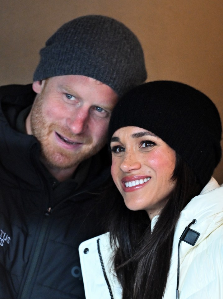 Prince Harry and Meghan Markle in winter hats.