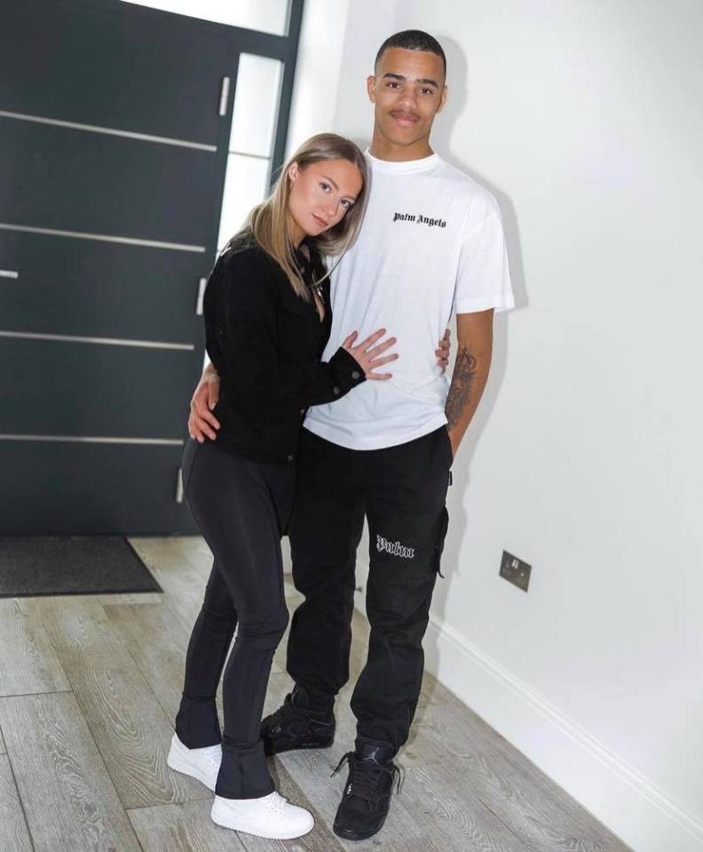 Mason Greenwood and Harriet Robson embracing.