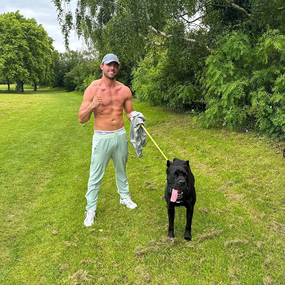 Jack Fincham walking his black Cane Corso dog, Elvis.