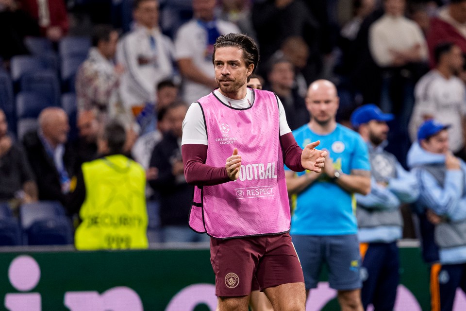 Jack Grealish of Manchester City warming up during a Champions League match.