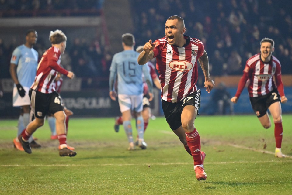 Josh Magennis of Exeter City celebrating a goal.