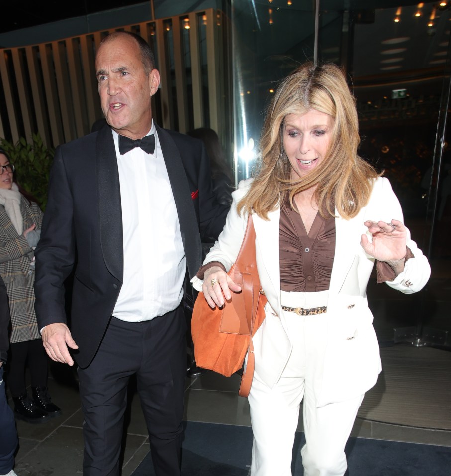 Kate Garraway and Johnny Vaughan leaving an awards afterparty.