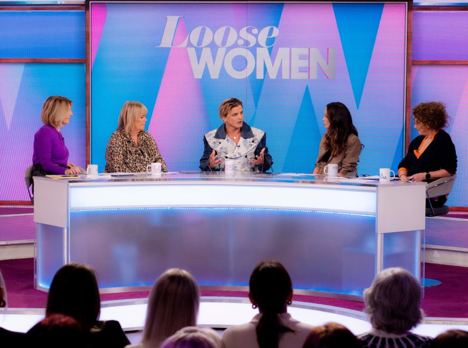 Panel of five women and one man on the set of the Loose Women TV show.