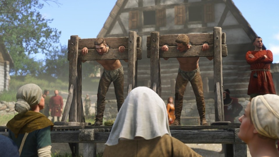 Screenshot of two men in pillory.