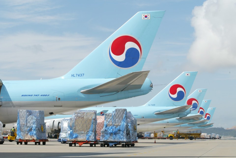 Korean Air Boeing 747-400F cargo planes at an airport.