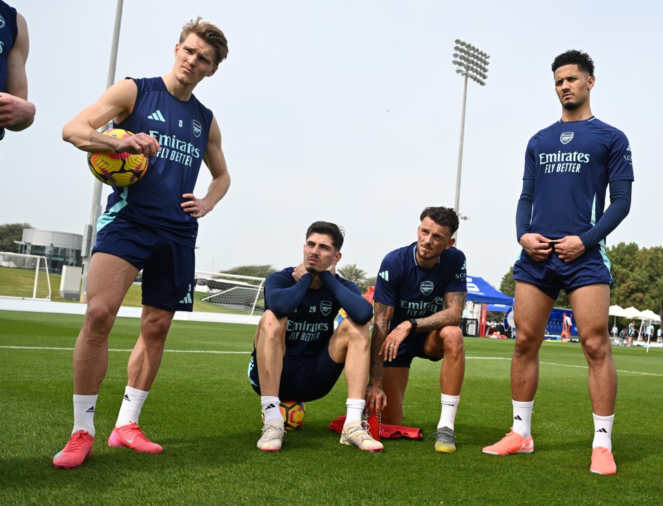 Arsenal players Martin Odegaard, Kai Havertz, Ben White, and William Saliba at a training session.