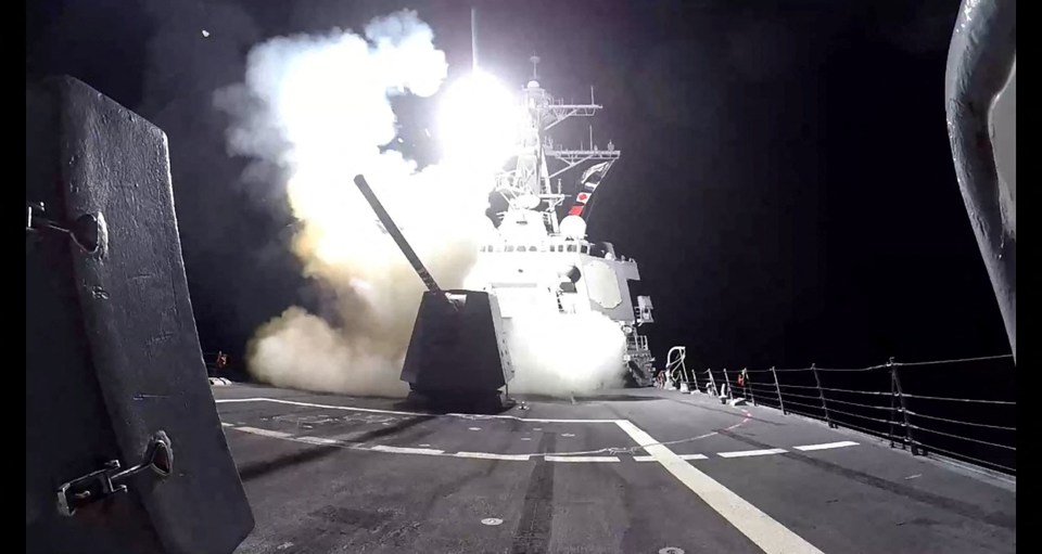 Tomahawk missile launch from a US Navy destroyer.