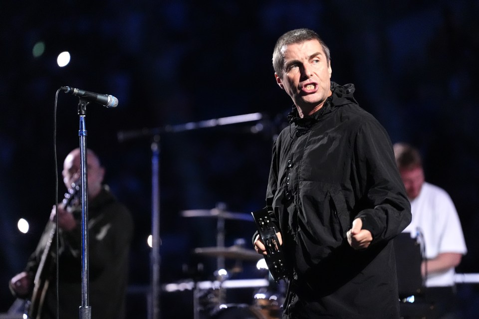 Liam Gallagher of Oasis performing at Wembley Stadium.