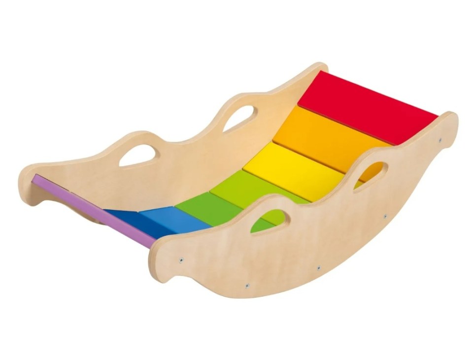 Rainbow-colored rocker toy for children.