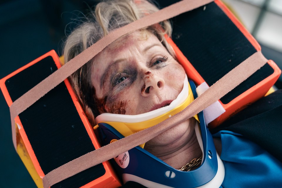 Injured woman in a neck brace.