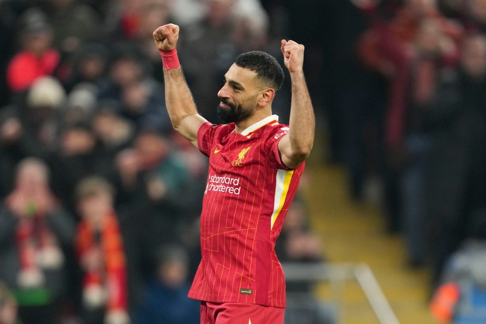 Mohamed Salah celebrating during a soccer match.