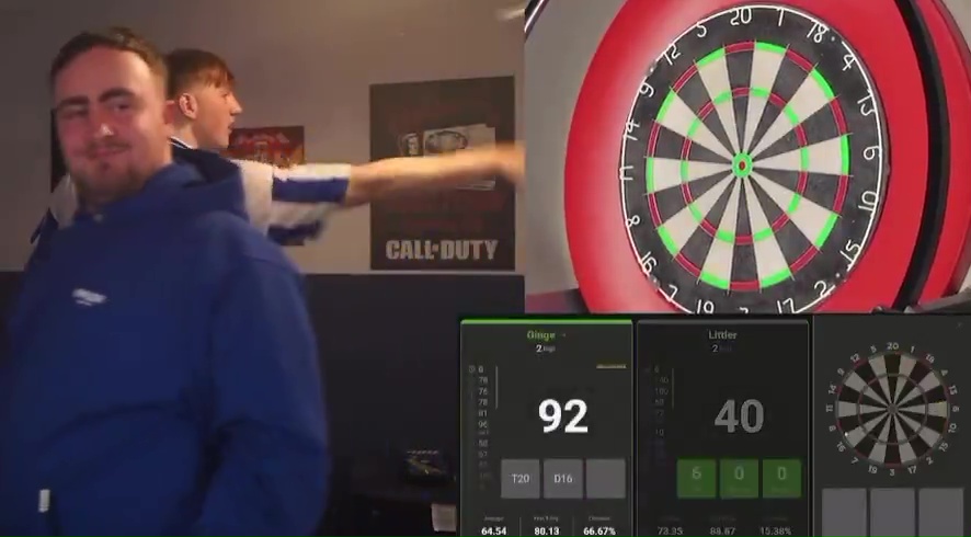 A darts match between Ginge and Littler, showing a player throwing a dart and the score.