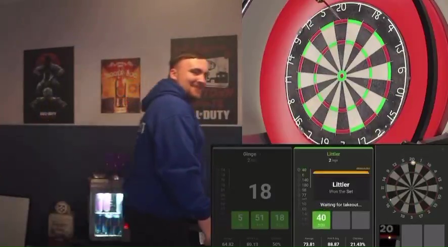 Screenshot of a darts match between Luke Littler and AngryGinge13, showing the score and Littler celebrating.