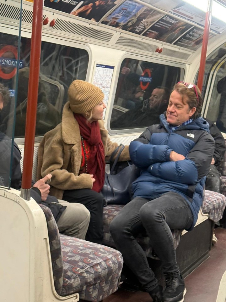 Singer Lulu on a London Underground train.