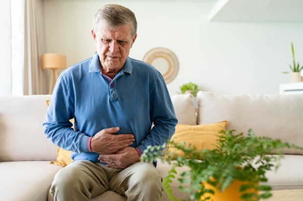 Man experiencing stomach pain.