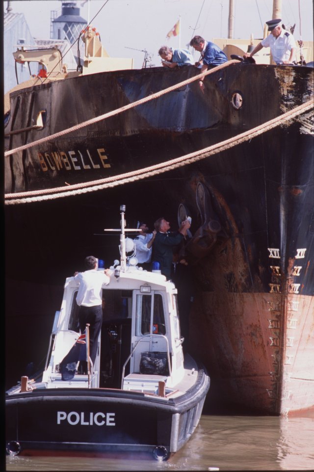 Accident investigators and police inspecting the Bowbelle after its collision with the Marchioness.