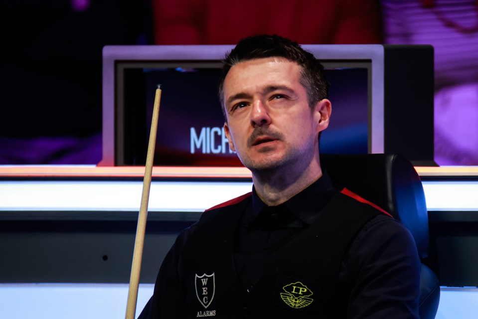 Michael Holt, snooker player, reacting during a quarterfinal match.