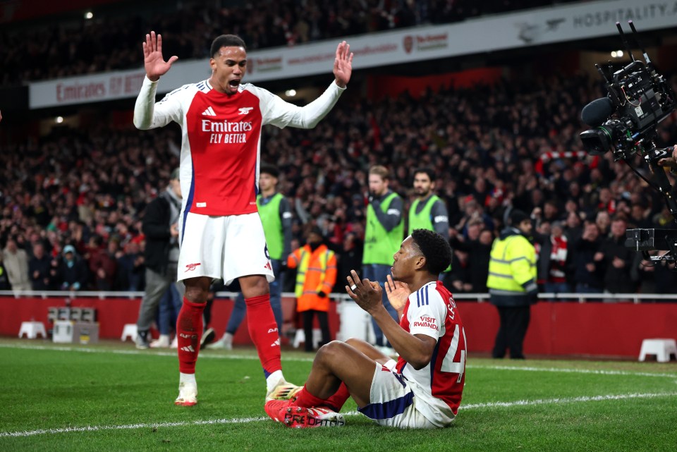 Arsenal players celebrate a goal.