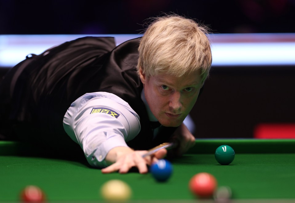 Neil Robertson playing snooker.