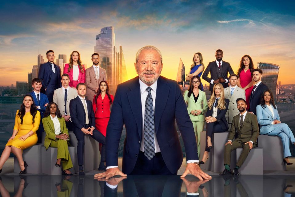 Promotional image of Lord Sugar with the candidates from a season of The Apprentice, in front of the London skyline.