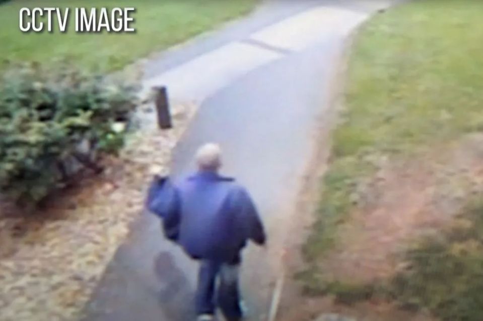 CCTV image of a man walking away.