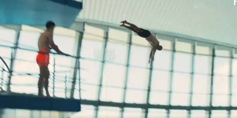 Nuno Espírito Santo diving into a pool.