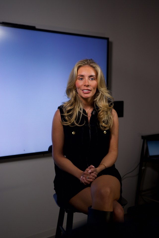 Bonnie Blue in a black dress, sitting for an interview.