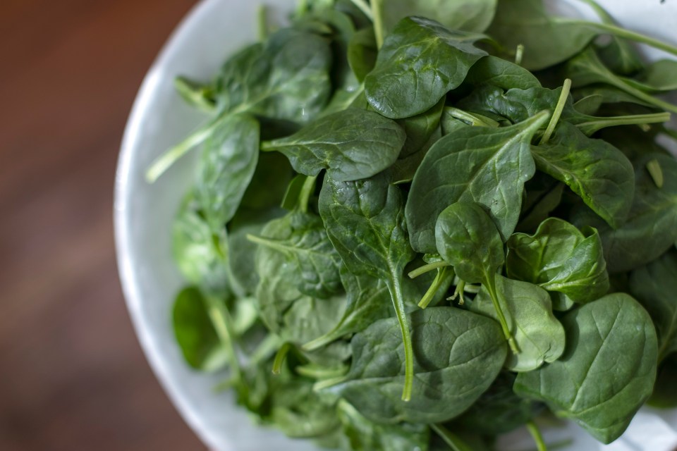 Plate of fresh spinach.