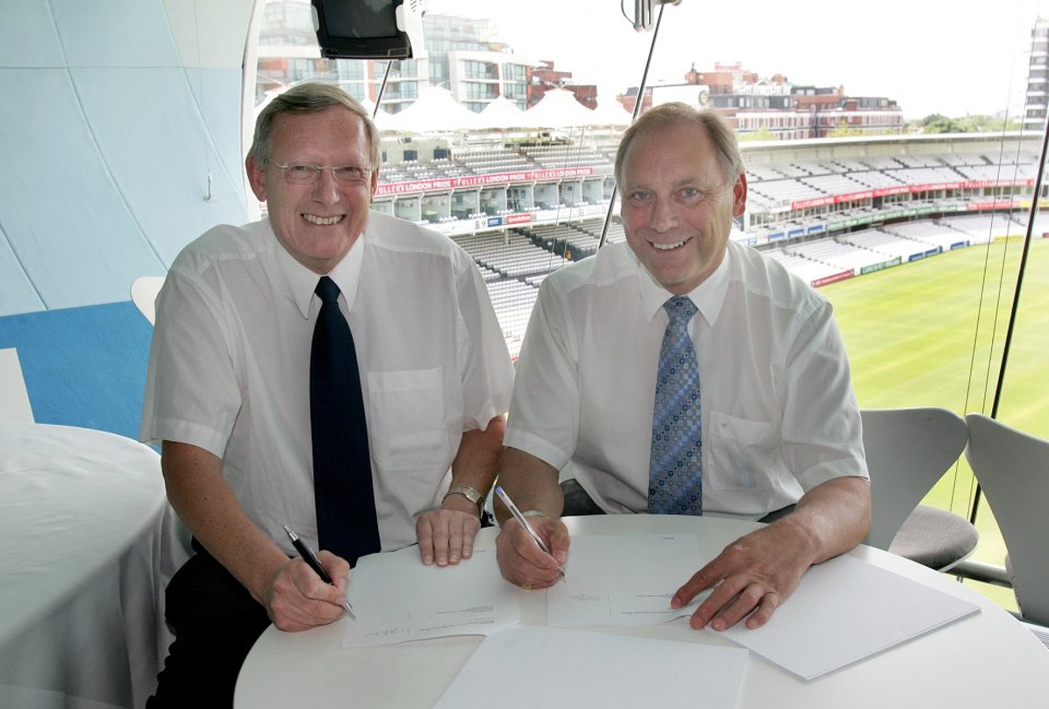 Photo of Dudley Ramsden and Colin Graves signing documents.