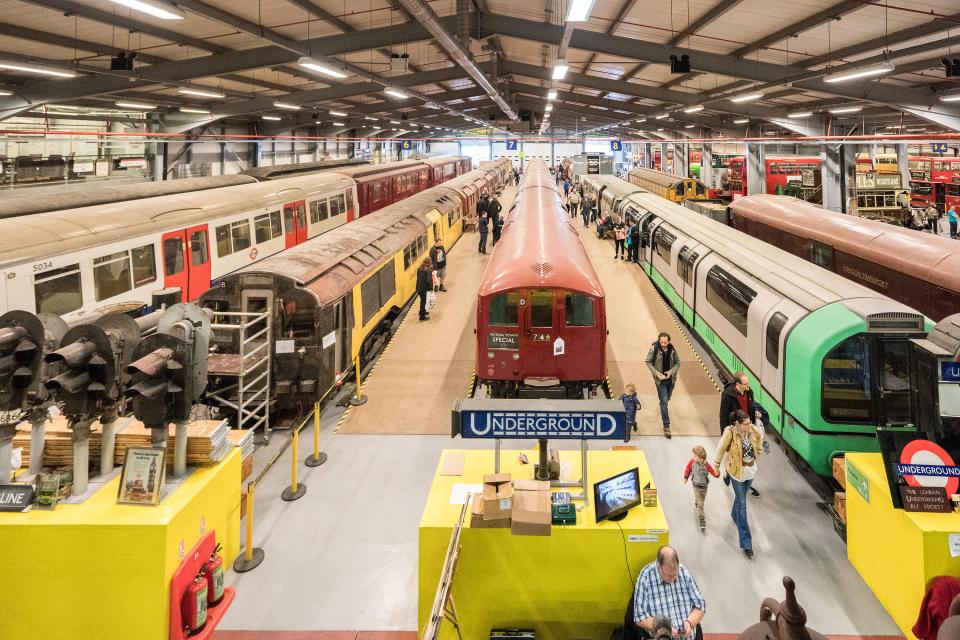 London Transport Museum Depot with various trains and buses.