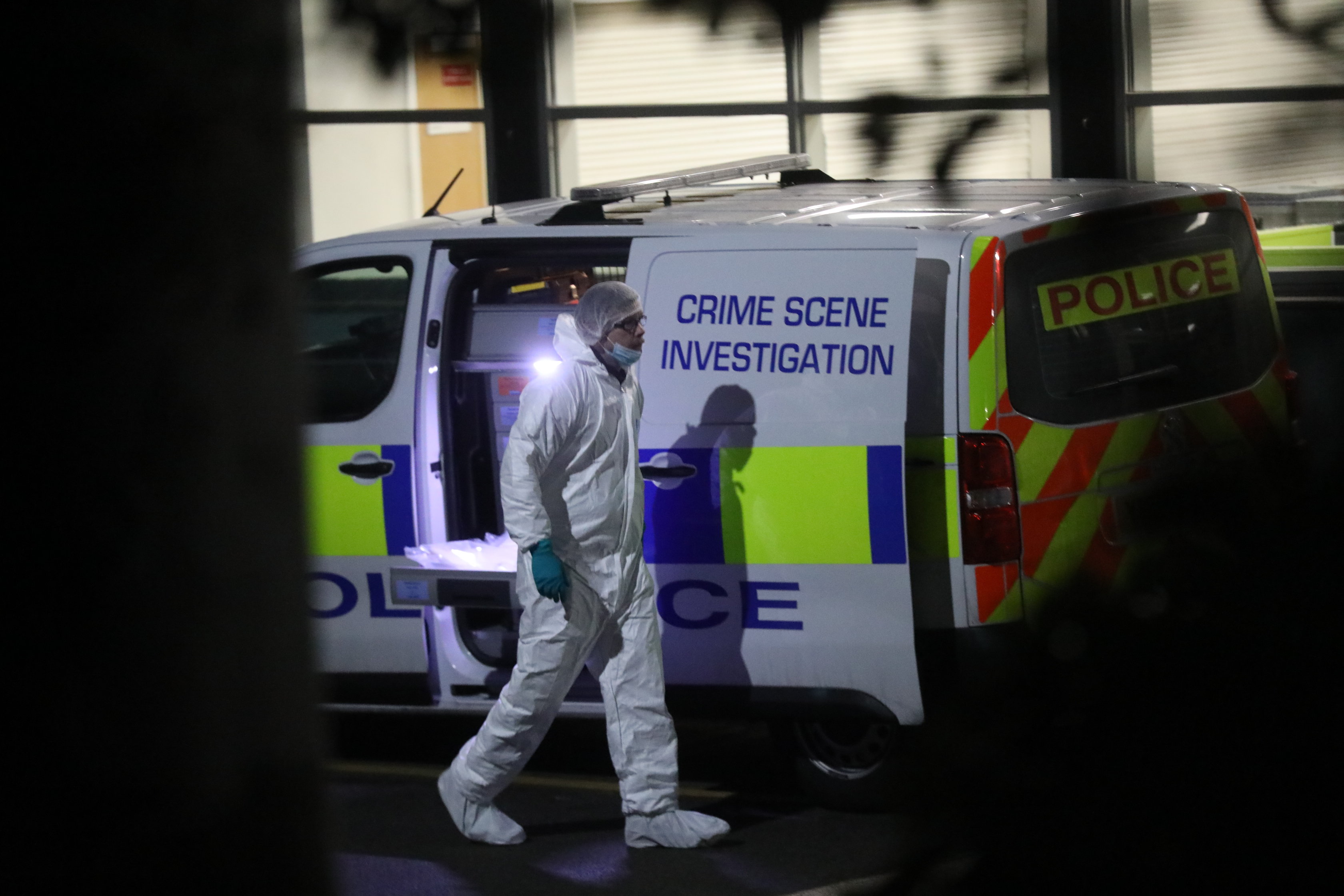 Forensic officer at a crime scene.