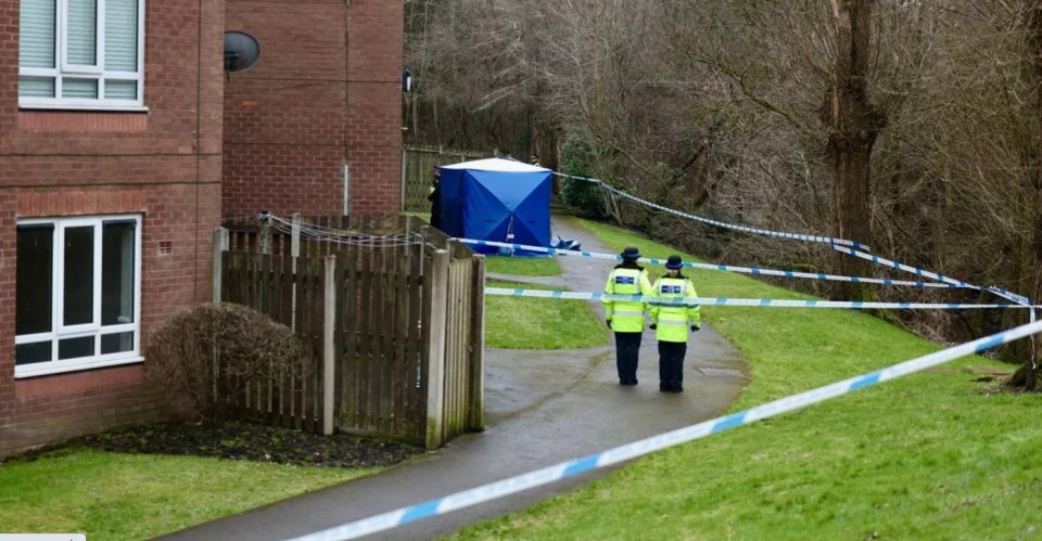 Police officers at a crime scene.