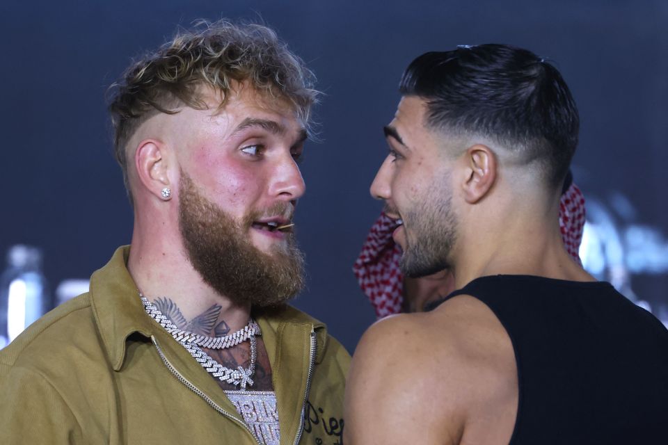 Jake Paul and Tommy Fury face off at a press conference.