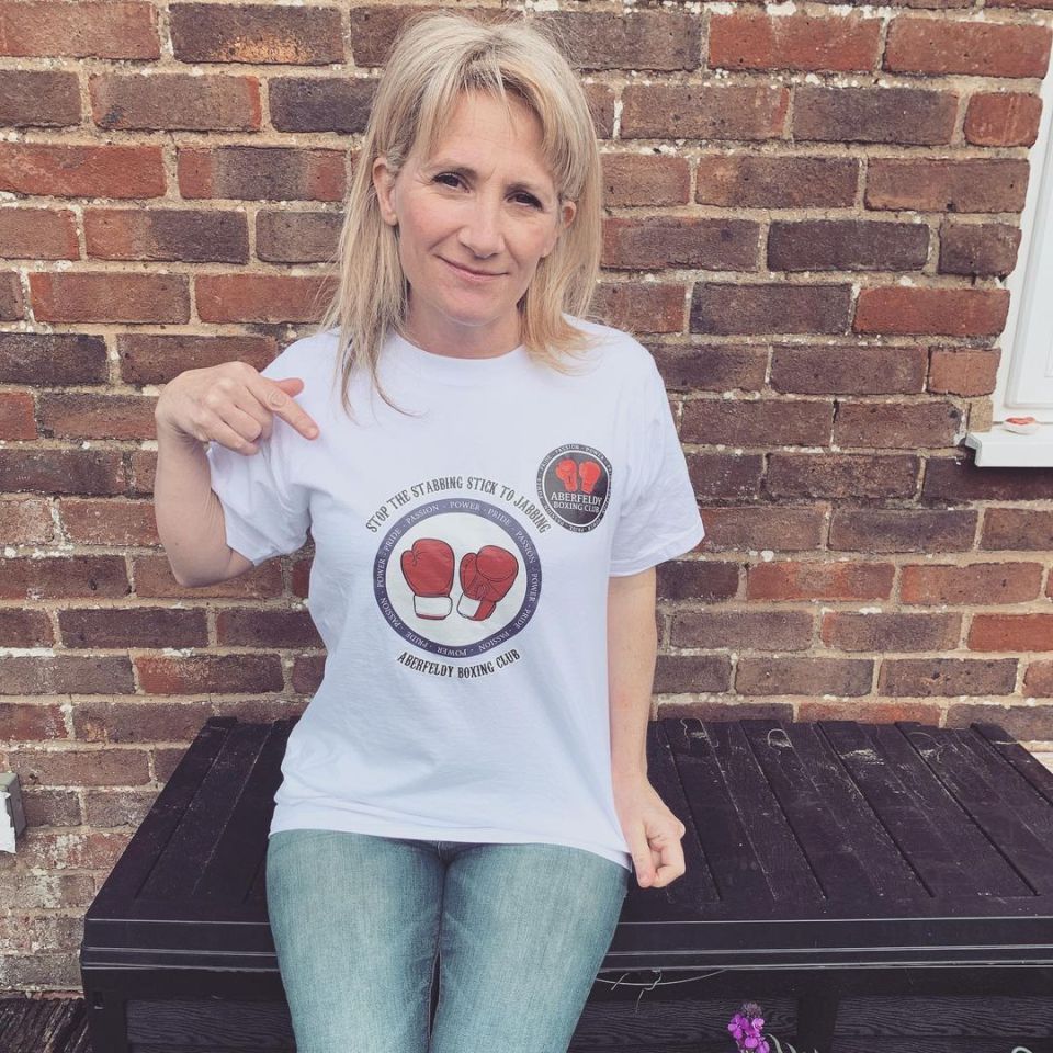 Lucy Speed wearing an Aberfeldy Boxing Club t-shirt.