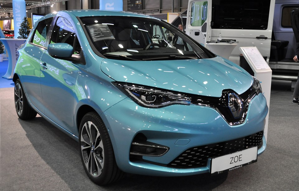 A light blue Renault Zoe electric car at a car show.