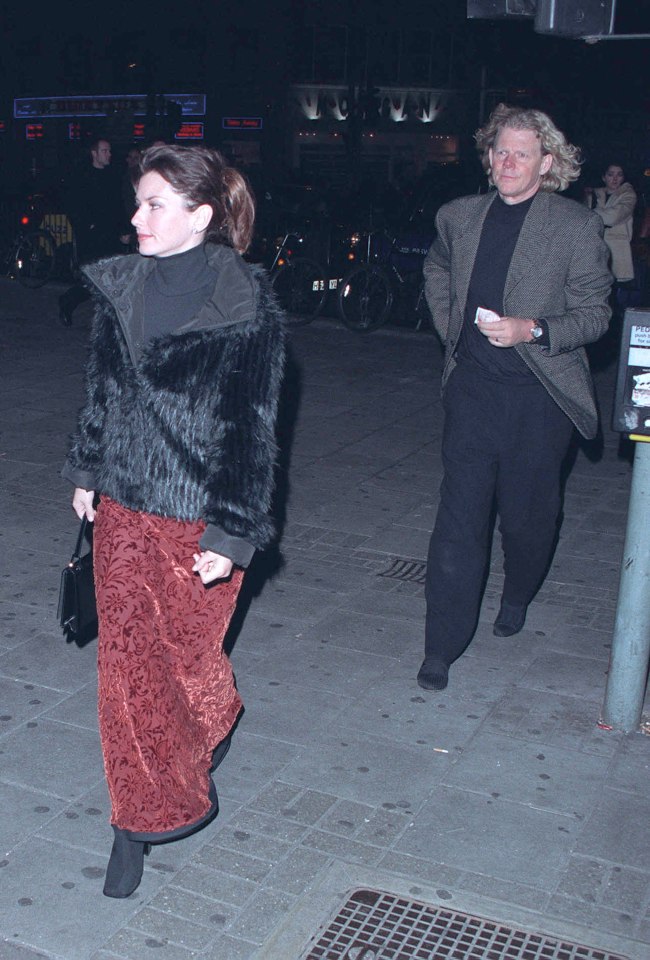 Shania Twain and Robert John Mutt Lange leaving a theatre.