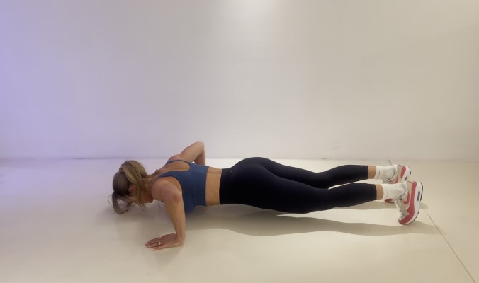 Woman doing push-ups.