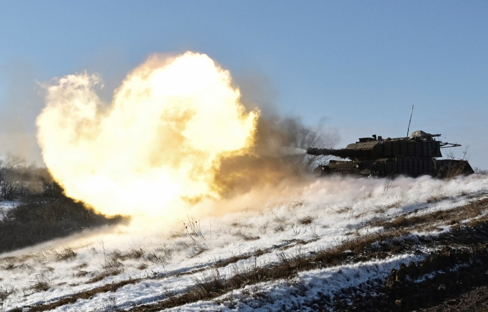 Ukrainian servicemen firing a Leopard 1A5 tank during training.